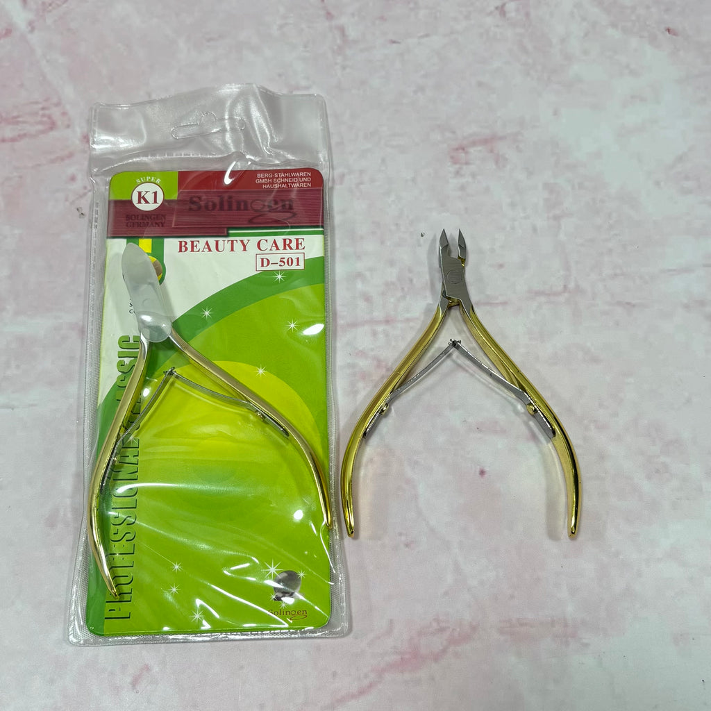 CORTACUTICULA SOLINGER METÁLICO DORADO